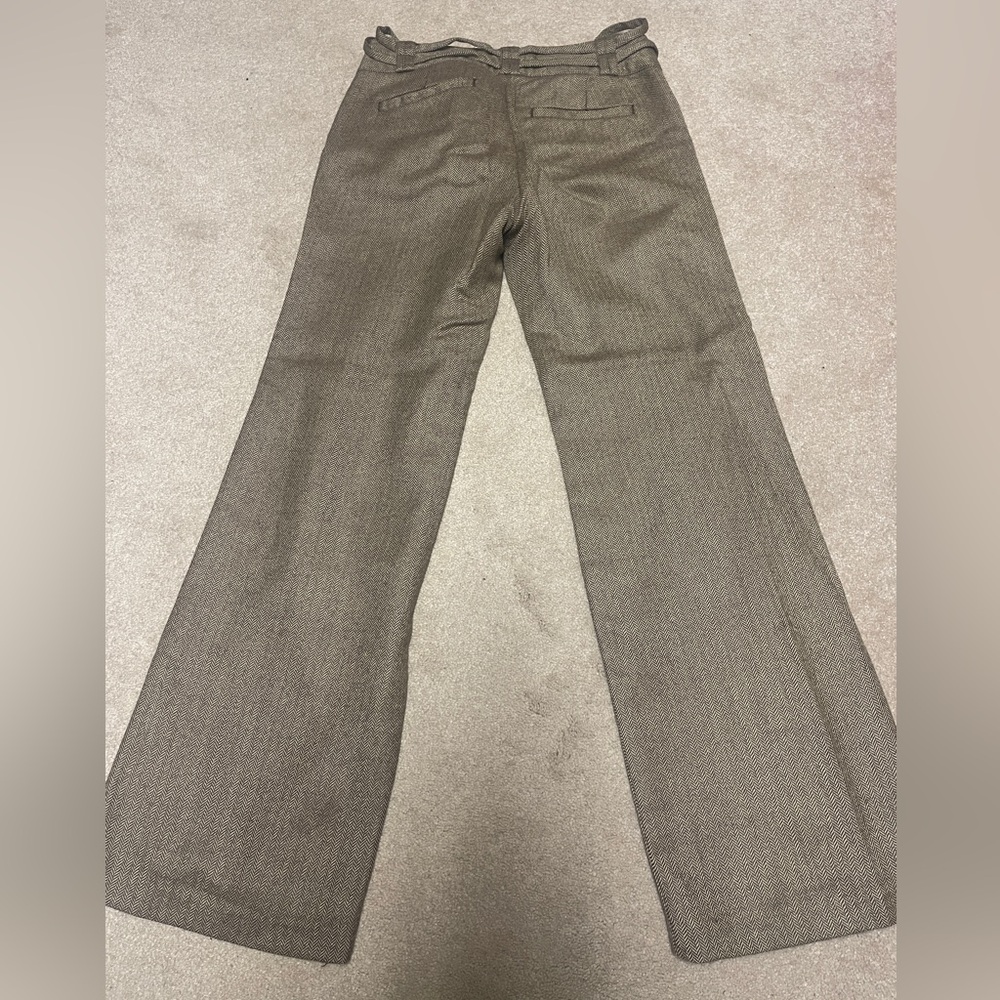 Wool drawstring dress pant.